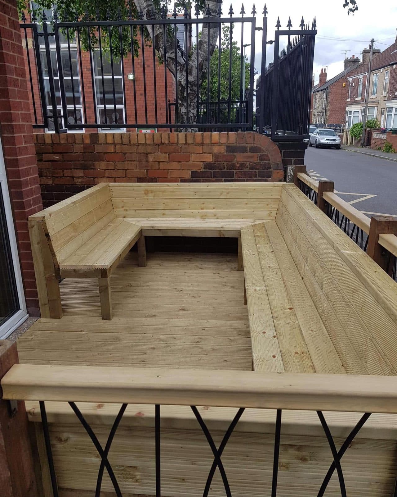 Timber decking with built-in corner bench seating